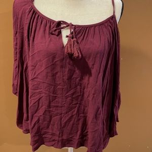 Beautiful burgundy cold shoulder blouse. Size XL.